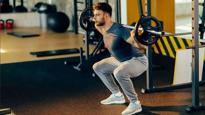 Man on a weight loss plan doing strength training