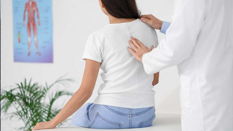 a woman with incorrect posture caused by extra weight