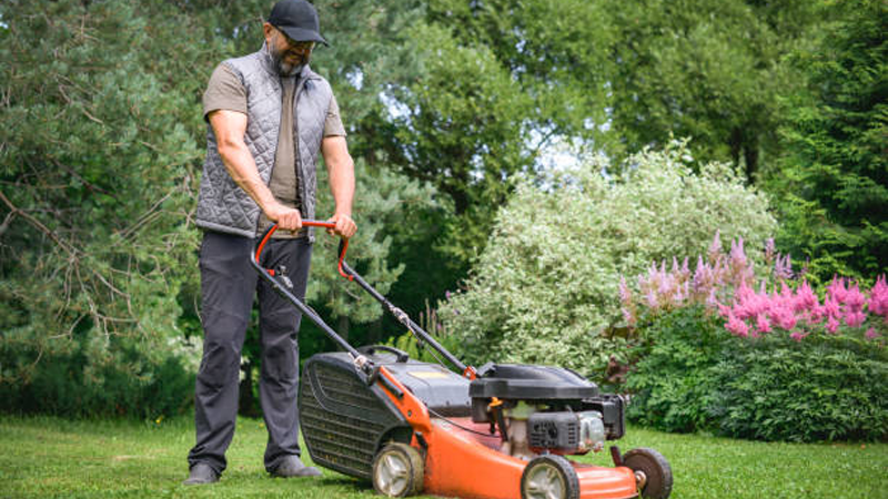 a slightly overweight man doing yard work